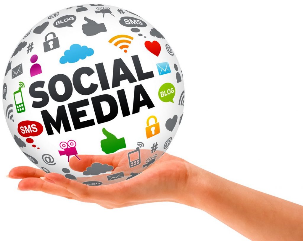 A social media ball held in a hand